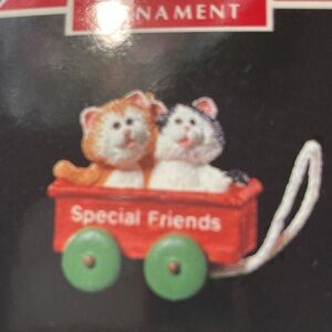 NRFB HALLMARK Keepsake mini Orn.
Special Friends, 2 animals in wagon $15